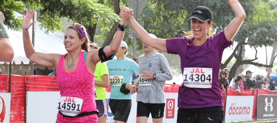 Helping Jodi cross the finish line of her first marathon in Honolulu will stay with me forever! http://www.runtothefinish.com